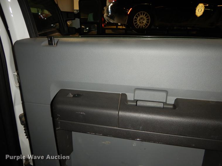 image for item DE1653 2012 Ford F250 Super Duty XL Crew Cab utility bed pickup truck