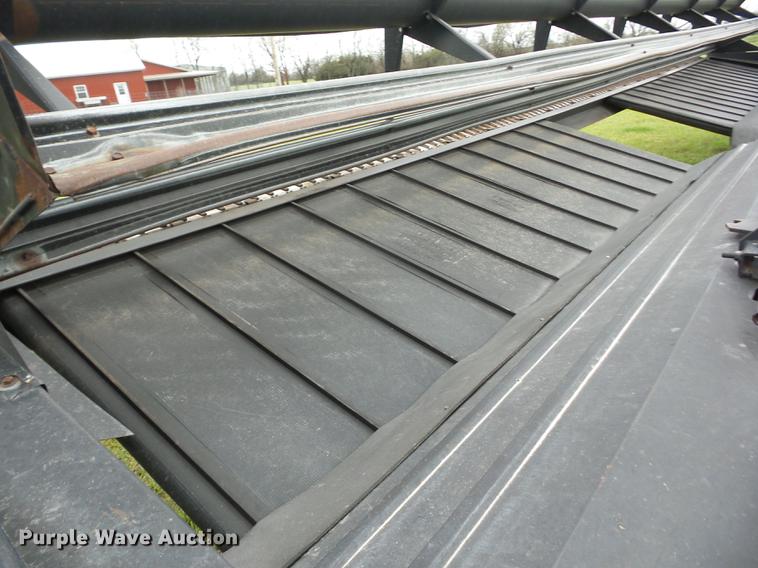 image for item AY9505 1997 MacDon 3000 windrower