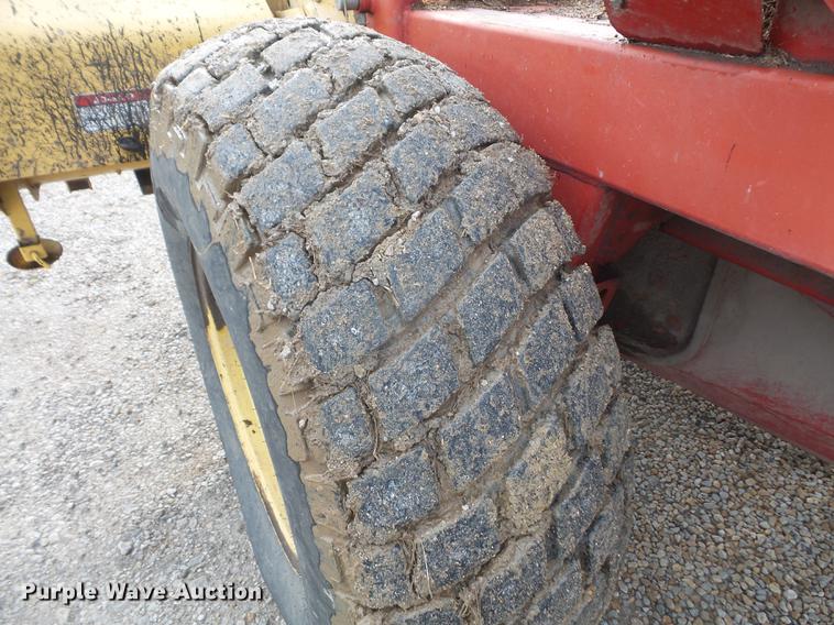 image for item DB6164 1994 New Holland 2450 windrower