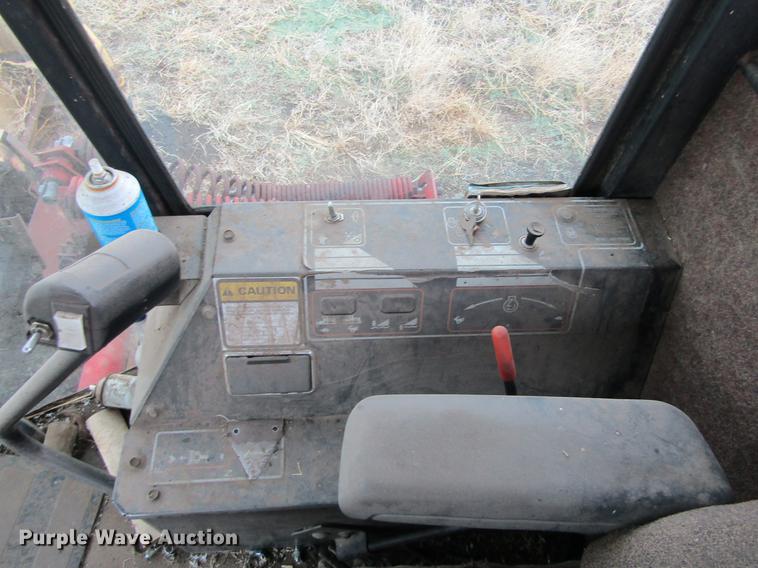 image for item DE6732 New Holland 2450 windrower