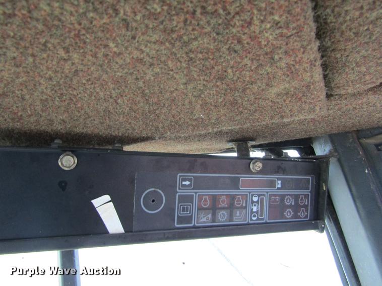 image for item DE6732 New Holland 2450 windrower