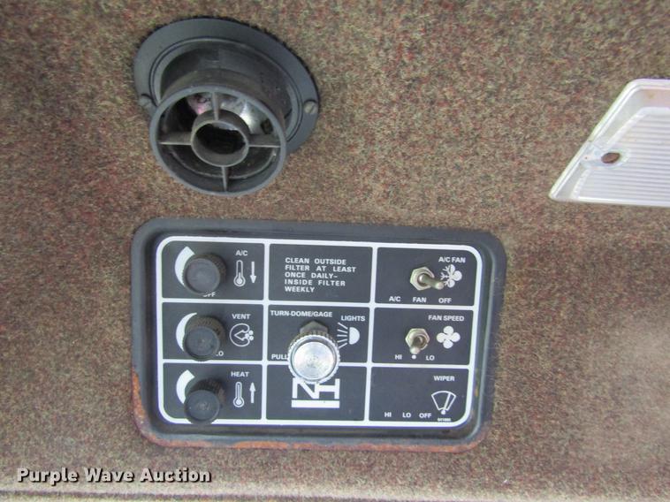 image for item DE6732 New Holland 2450 windrower