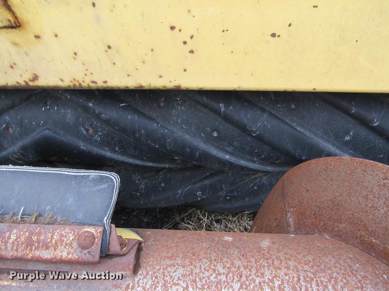 image for item DE6732 New Holland 2450 windrower