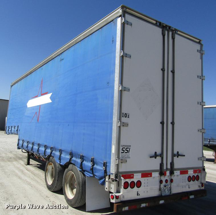 image for item DC4302 2011 Wilson CFD-900 side curtain trailer