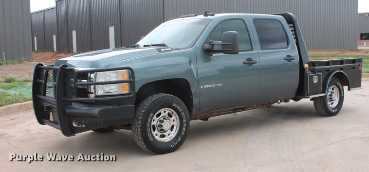 image for item DB5212 2007 Chevrolet Silverado 2500HD Crew Cab flatbed pickup truck