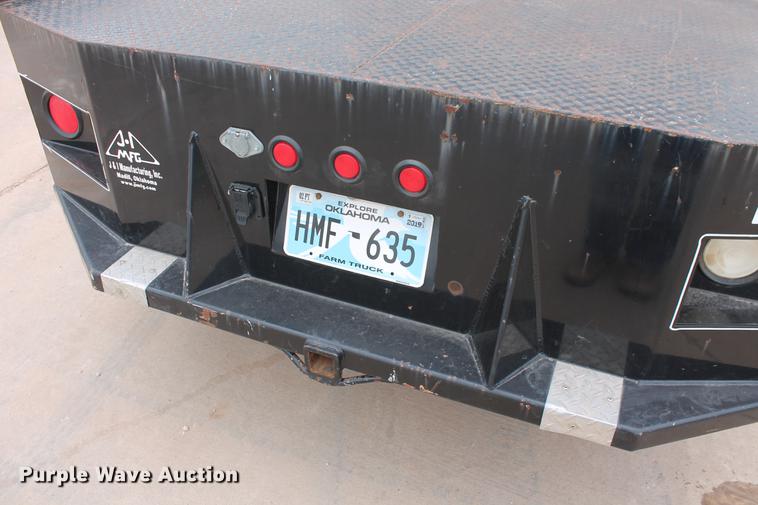 image for item DB5212 2007 Chevrolet Silverado 2500HD Crew Cab flatbed pickup truck