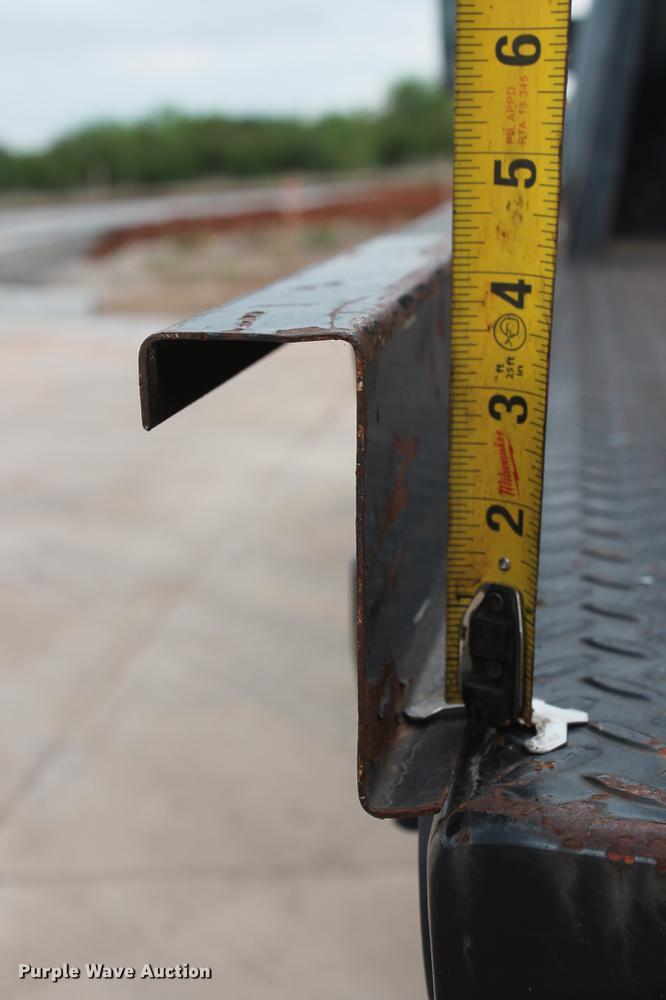 image for item DB5212 2007 Chevrolet Silverado 2500HD Crew Cab flatbed pickup truck