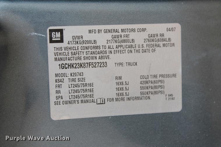 image for item DB5212 2007 Chevrolet Silverado 2500HD Crew Cab flatbed pickup truck