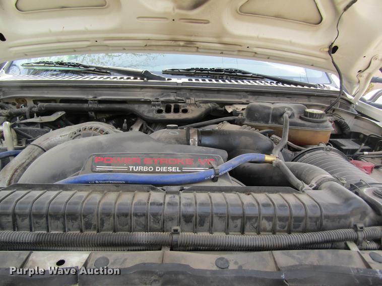 image for item DC4253 2006 Ford F350 Super Duty flatbed pickup truck