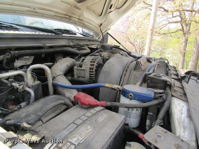 image for item DC4253 2006 Ford F350 Super Duty flatbed pickup truck