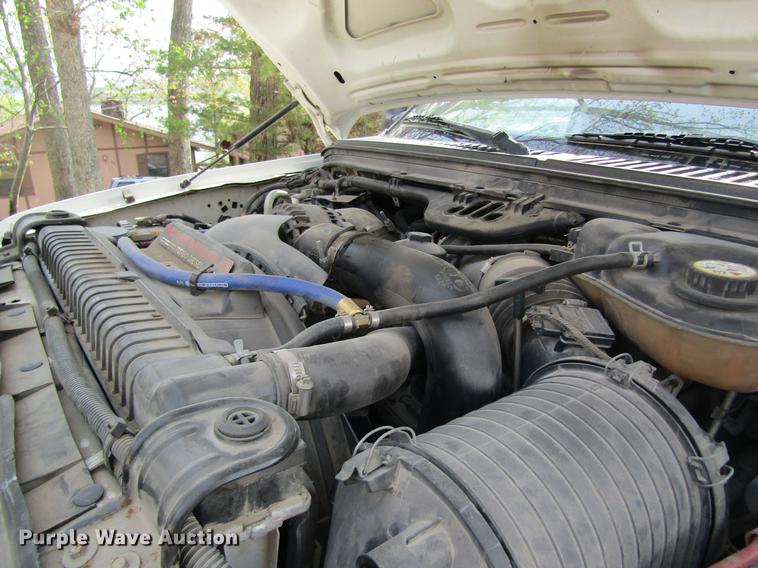 image for item DC4253 2006 Ford F350 Super Duty flatbed pickup truck