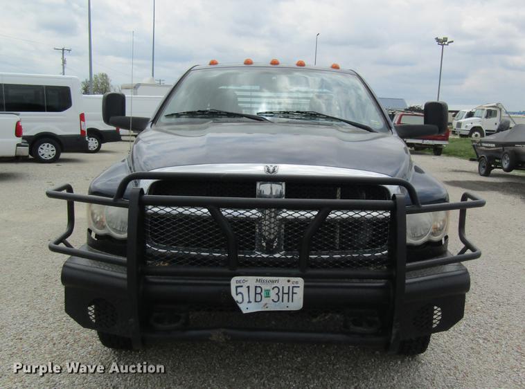 image for item DC4257 2004 Dodge Ram 3500 Quad Cab flatbed pickup truck