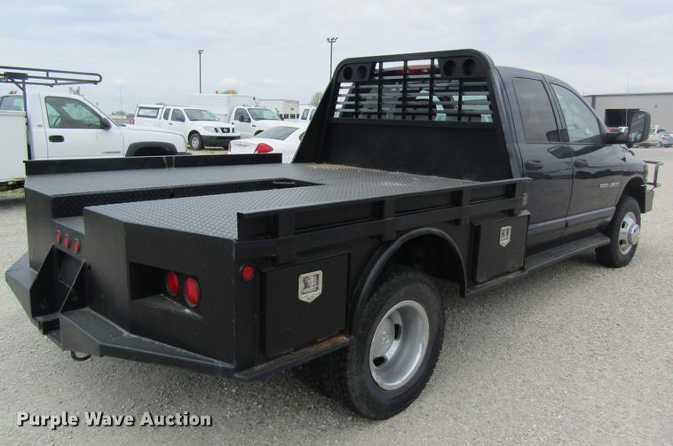image for item DC4257 2004 Dodge Ram 3500 Quad Cab flatbed pickup truck