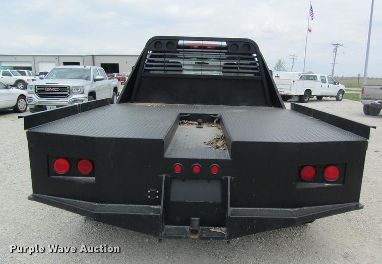 image for item DC4257 2004 Dodge Ram 3500 Quad Cab flatbed pickup truck