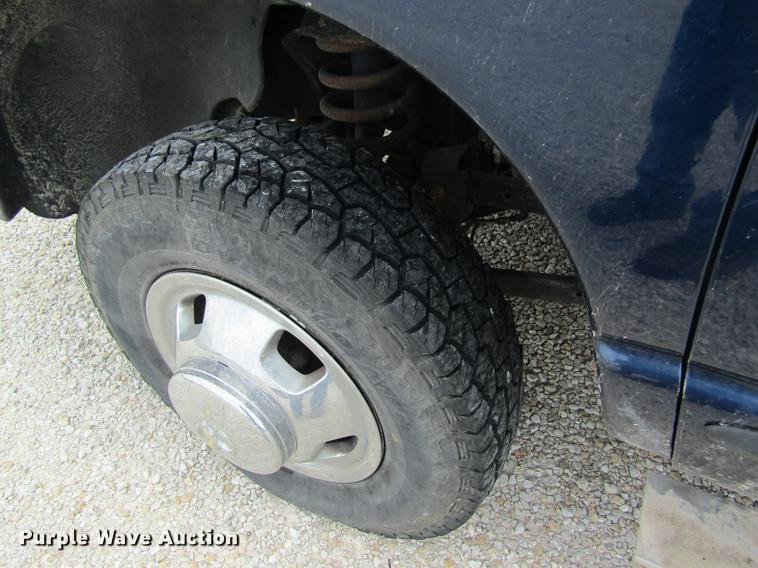 image for item DC4257 2004 Dodge Ram 3500 Quad Cab flatbed pickup truck