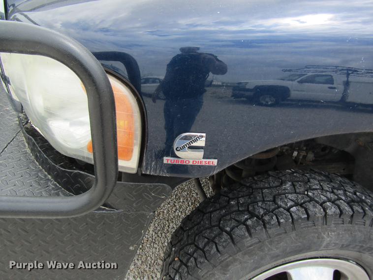 image for item DC4257 2004 Dodge Ram 3500 Quad Cab flatbed pickup truck