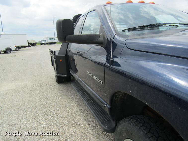 image for item DC4257 2004 Dodge Ram 3500 Quad Cab flatbed pickup truck