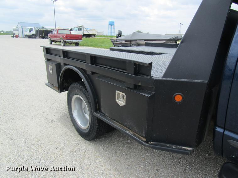 image for item DC4257 2004 Dodge Ram 3500 Quad Cab flatbed pickup truck