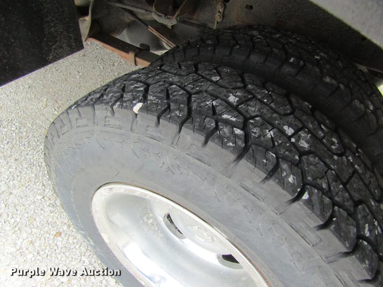 image for item DC4257 2004 Dodge Ram 3500 Quad Cab flatbed pickup truck