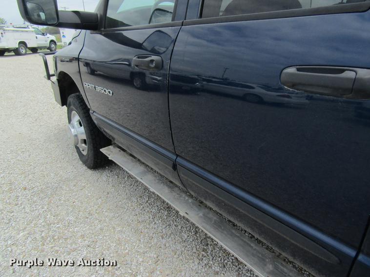 image for item DC4257 2004 Dodge Ram 3500 Quad Cab flatbed pickup truck