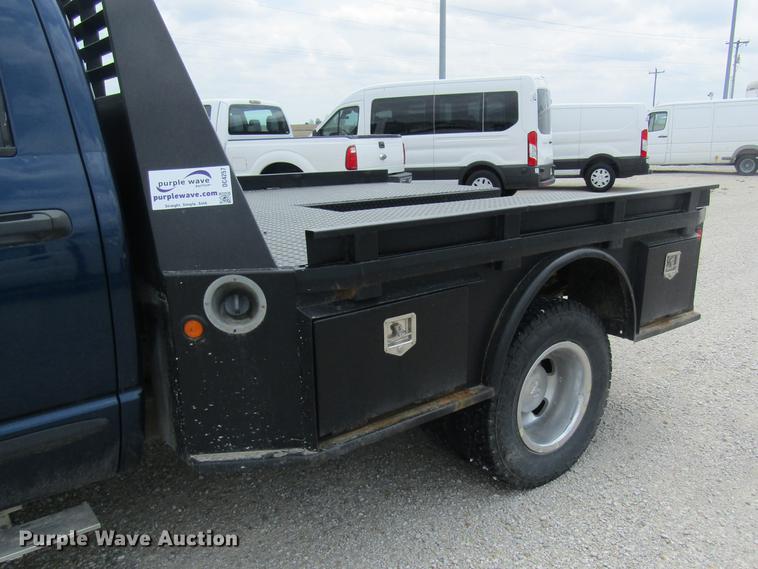 image for item DC4257 2004 Dodge Ram 3500 Quad Cab flatbed pickup truck