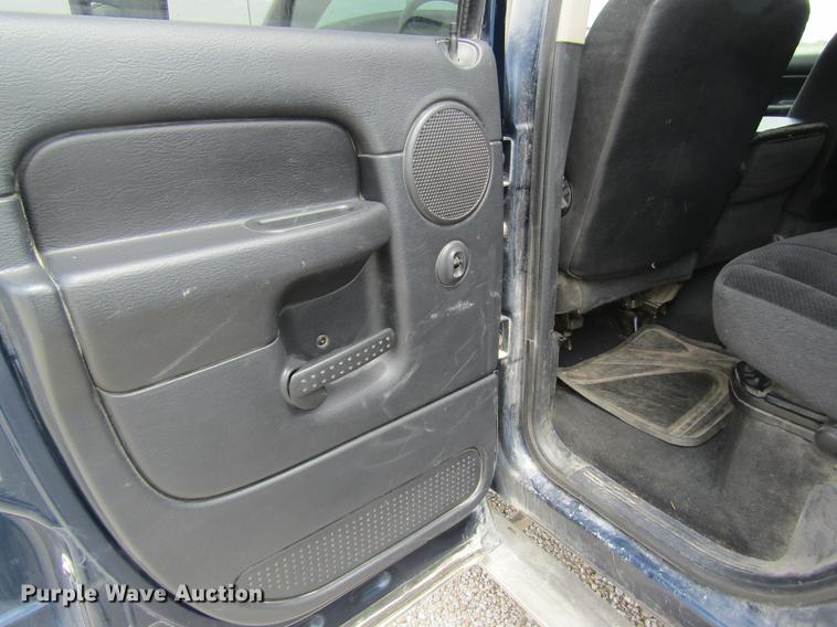 image for item DC4257 2004 Dodge Ram 3500 Quad Cab flatbed pickup truck