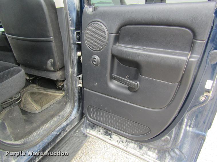 image for item DC4257 2004 Dodge Ram 3500 Quad Cab flatbed pickup truck