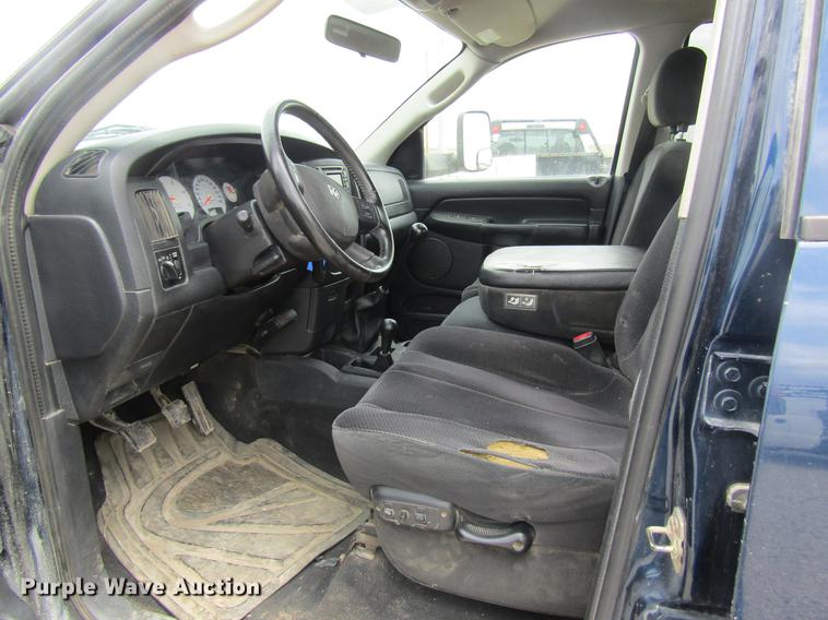 image for item DC4257 2004 Dodge Ram 3500 Quad Cab flatbed pickup truck