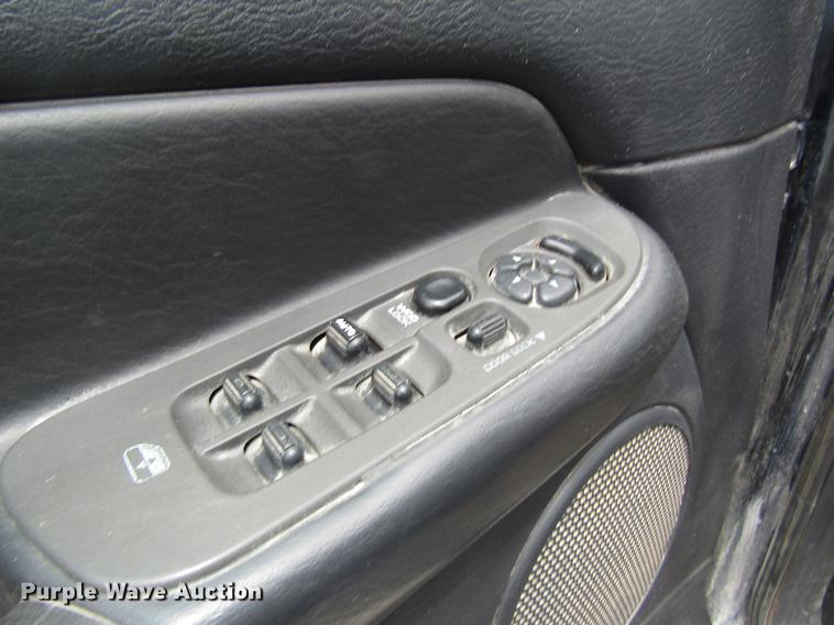 image for item DC4257 2004 Dodge Ram 3500 Quad Cab flatbed pickup truck