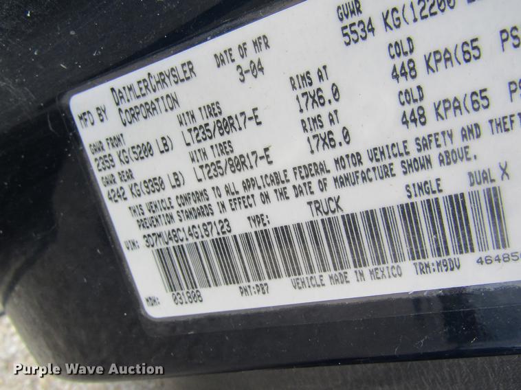 image for item DC4257 2004 Dodge Ram 3500 Quad Cab flatbed pickup truck