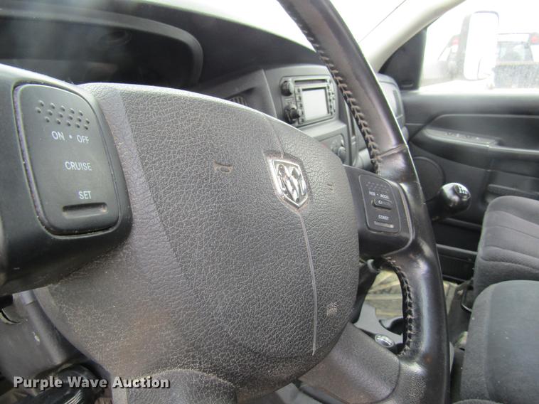 image for item DC4257 2004 Dodge Ram 3500 Quad Cab flatbed pickup truck