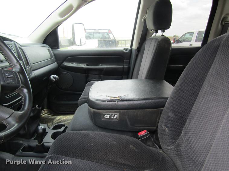 image for item DC4257 2004 Dodge Ram 3500 Quad Cab flatbed pickup truck