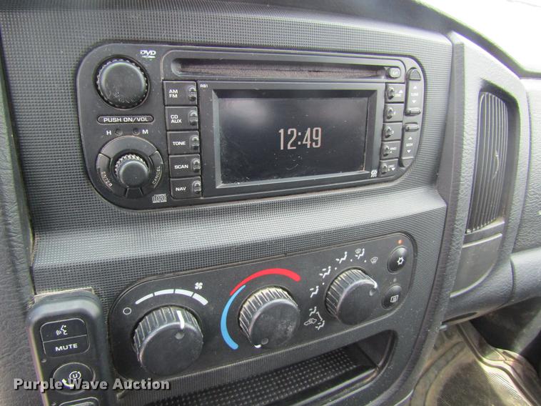 image for item DC4257 2004 Dodge Ram 3500 Quad Cab flatbed pickup truck