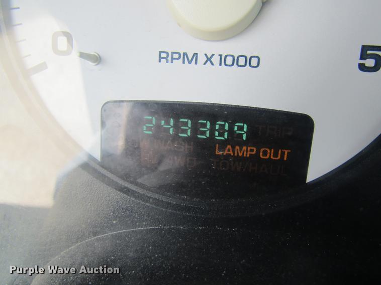 image for item DC4257 2004 Dodge Ram 3500 Quad Cab flatbed pickup truck