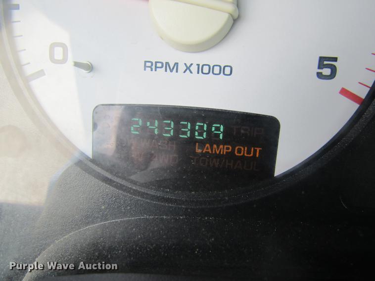 image for item DC4257 2004 Dodge Ram 3500 Quad Cab flatbed pickup truck