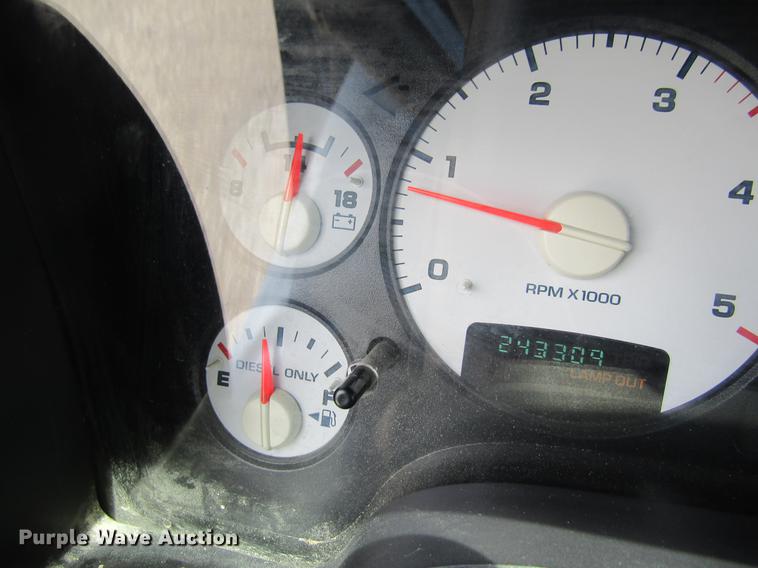 image for item DC4257 2004 Dodge Ram 3500 Quad Cab flatbed pickup truck