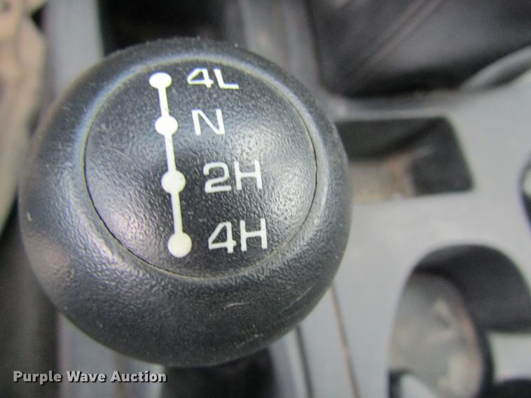 image for item DC4257 2004 Dodge Ram 3500 Quad Cab flatbed pickup truck