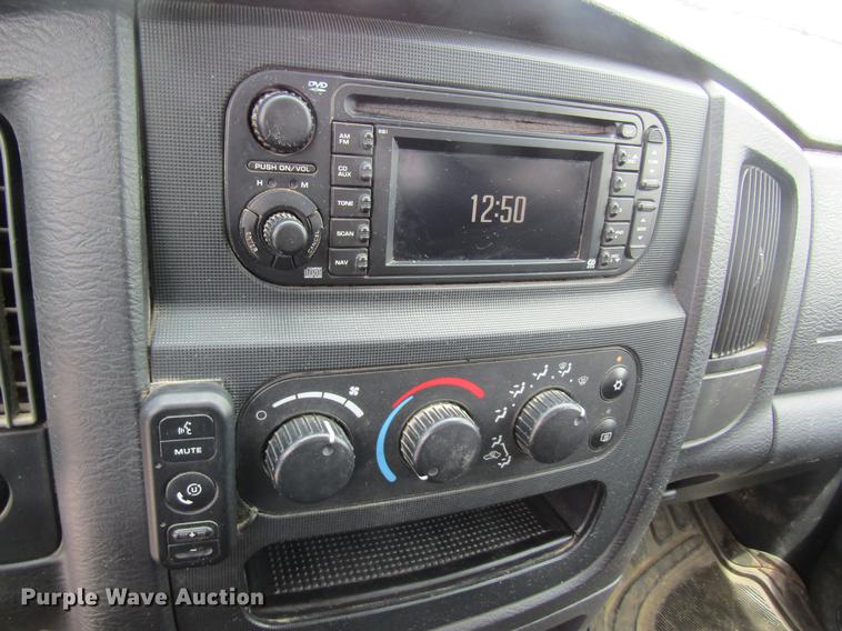 image for item DC4257 2004 Dodge Ram 3500 Quad Cab flatbed pickup truck