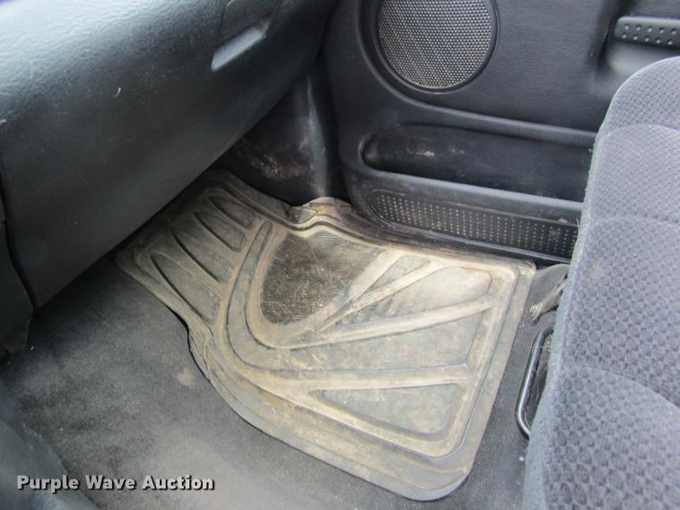 image for item DC4257 2004 Dodge Ram 3500 Quad Cab flatbed pickup truck