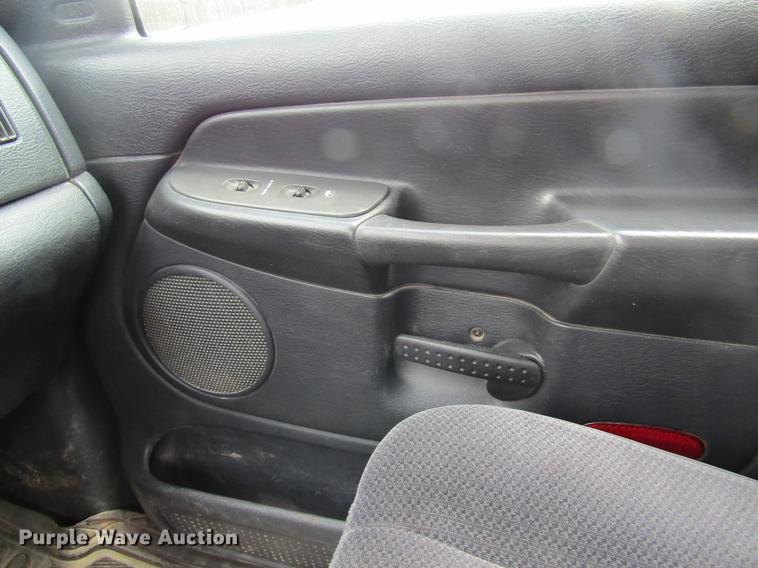 image for item DC4257 2004 Dodge Ram 3500 Quad Cab flatbed pickup truck