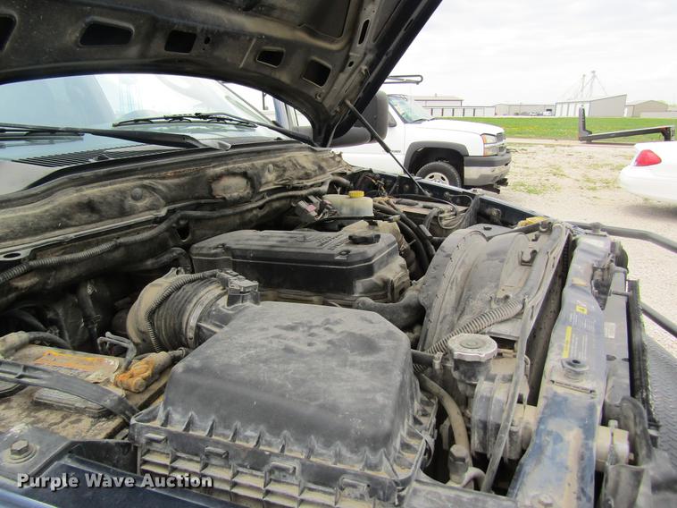 image for item DC4257 2004 Dodge Ram 3500 Quad Cab flatbed pickup truck