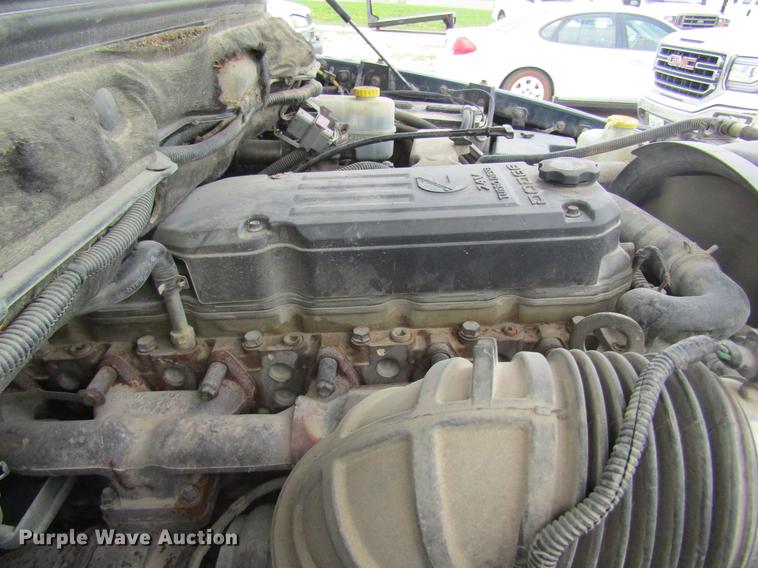 image for item DC4257 2004 Dodge Ram 3500 Quad Cab flatbed pickup truck