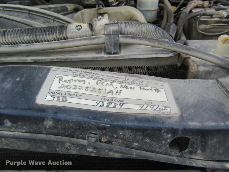 image for item DC4257 2004 Dodge Ram 3500 Quad Cab flatbed pickup truck