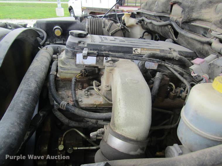 image for item DC4257 2004 Dodge Ram 3500 Quad Cab flatbed pickup truck