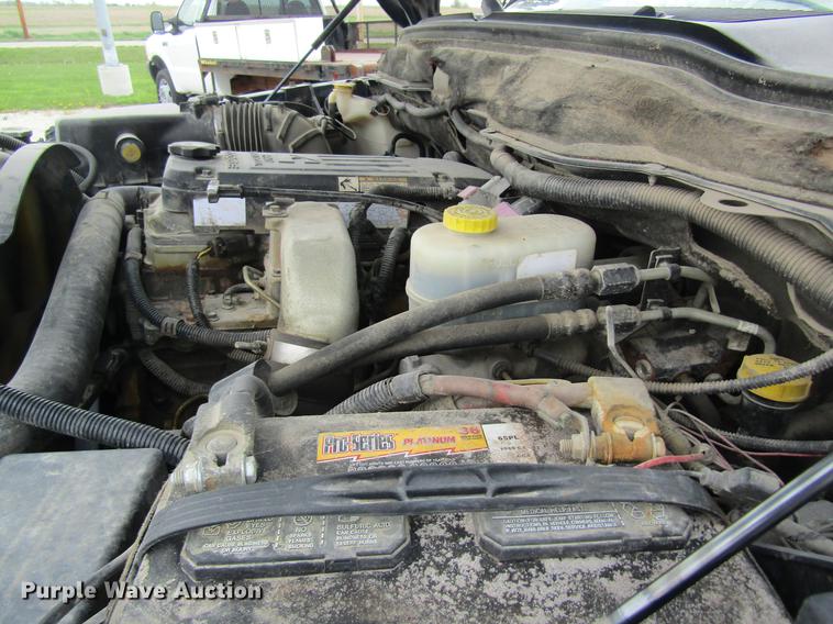 image for item DC4257 2004 Dodge Ram 3500 Quad Cab flatbed pickup truck