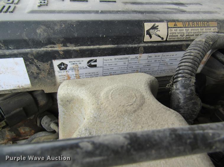 image for item DC4257 2004 Dodge Ram 3500 Quad Cab flatbed pickup truck