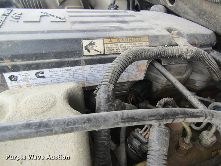 image for item DC4257 2004 Dodge Ram 3500 Quad Cab flatbed pickup truck