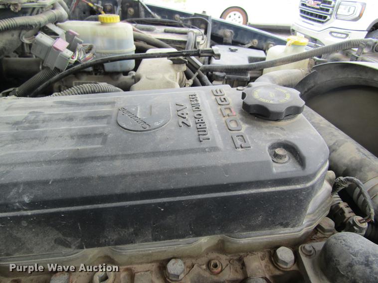 image for item DC4257 2004 Dodge Ram 3500 Quad Cab flatbed pickup truck