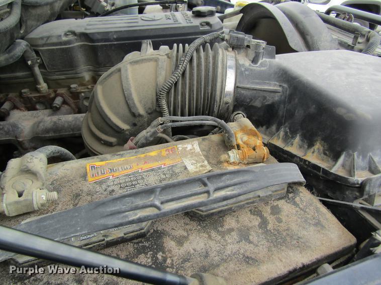 image for item DC4257 2004 Dodge Ram 3500 Quad Cab flatbed pickup truck