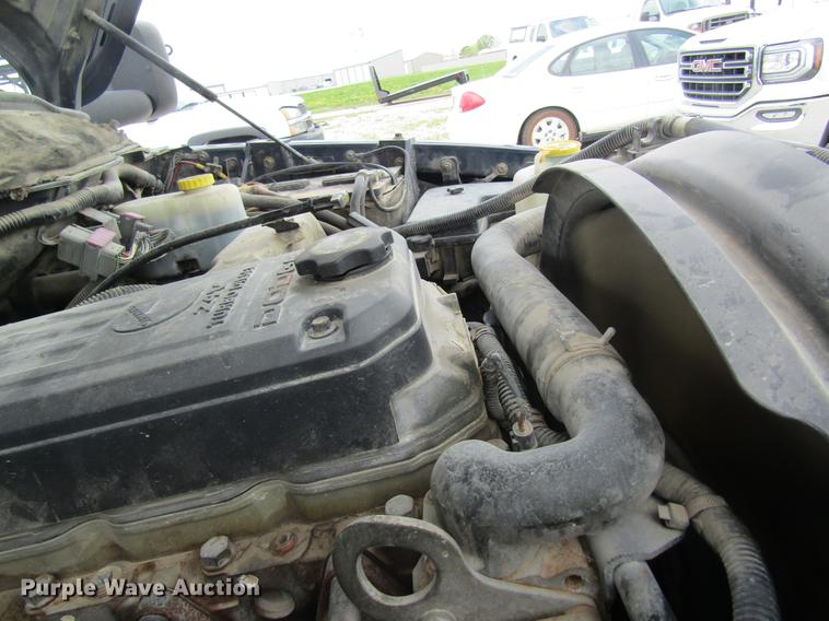 image for item DC4257 2004 Dodge Ram 3500 Quad Cab flatbed pickup truck